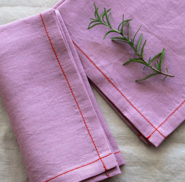 White linen napkins made in the USA with pink stitching. – celina mancurti